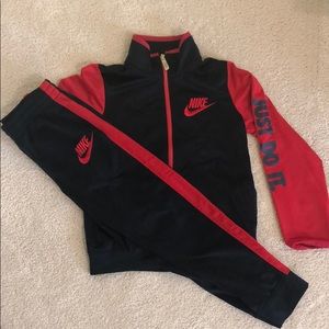 Nike size 7 navy/red track suit